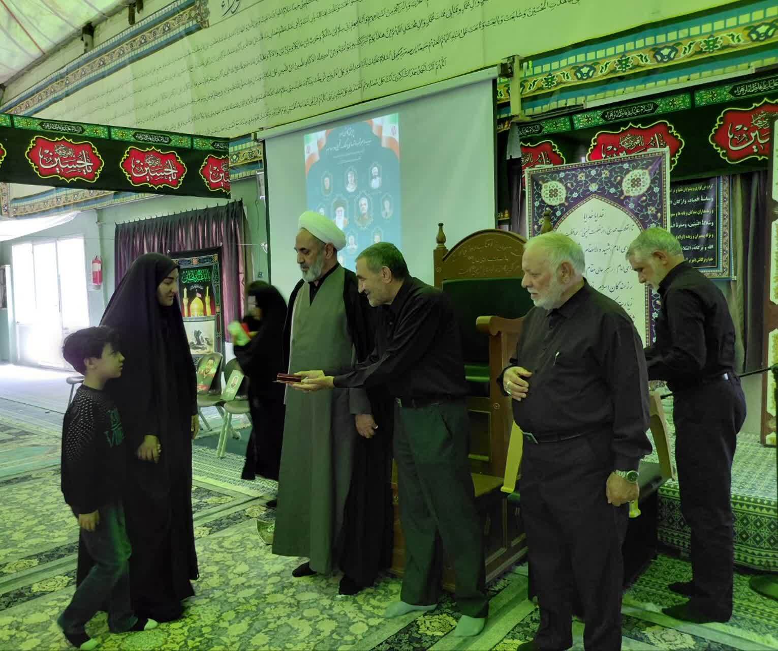 تجلیل از خانواده‌های شهدای جنگ رمضان در کرمان